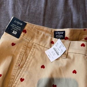 Chino pants with heart embroidery